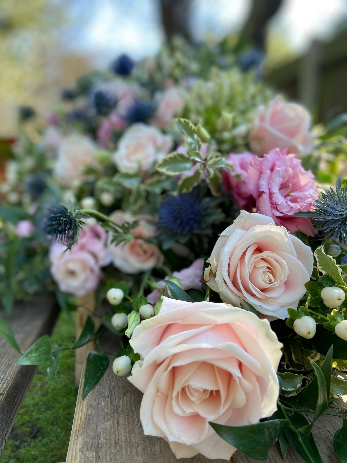 Casket Spray – Pink & Blue Funeral Tribute Flowers (Rose, Thistle & Agapanthus)