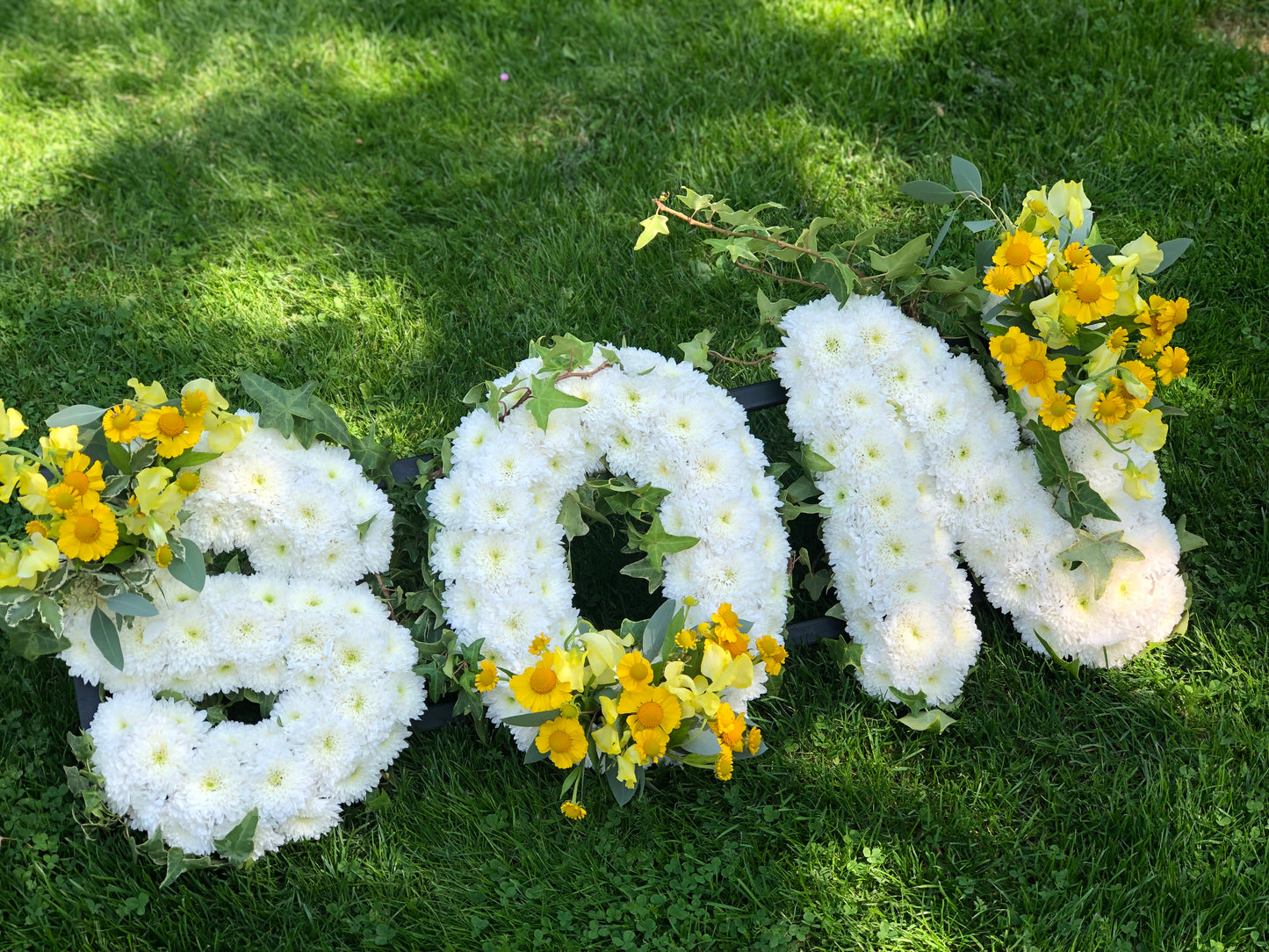 Letter-Shaped Funeral Tribute – Son