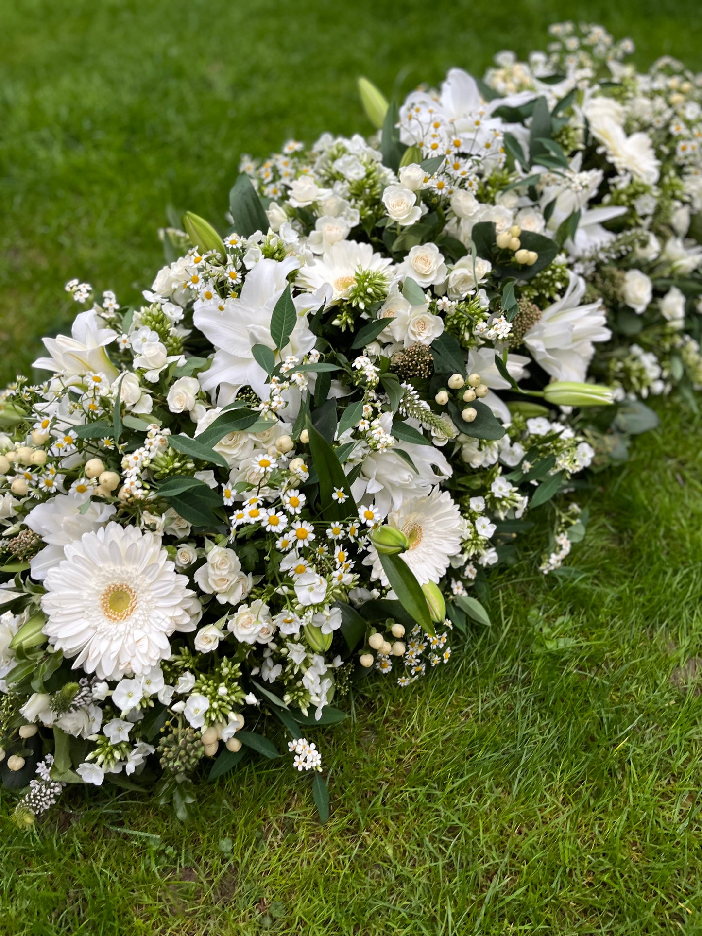 Casket Spray – White Funeral Tribute Flowers (Roses, Lily & Gerbera)
