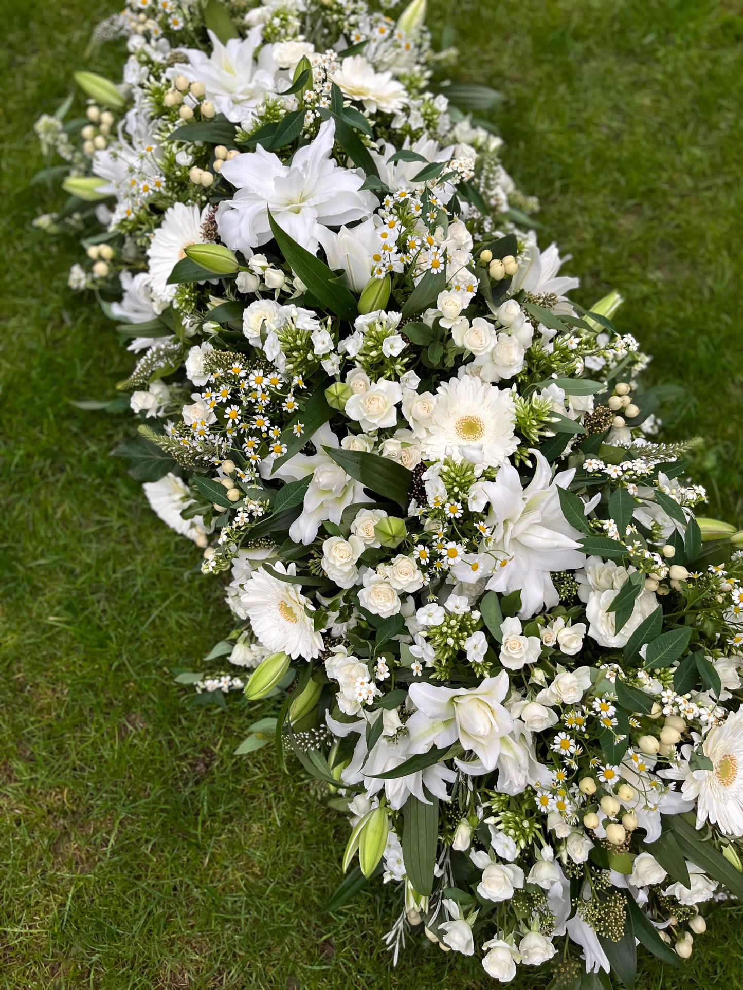 Casket Spray – White Funeral Tribute Flowers (Roses, Lily & Gerbera)